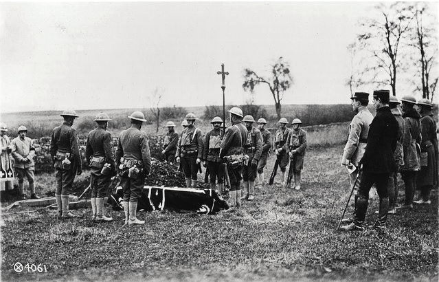 The burial ceremony held for the first soldiers to die in World War I near Bathelemont, France on November 08, 1917