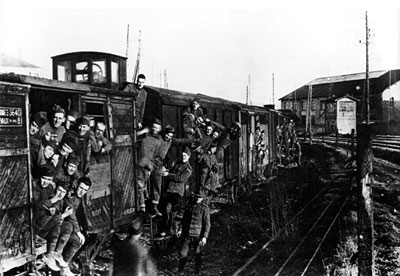 U.S. Doughboys on a French train and 40and8 boxcars