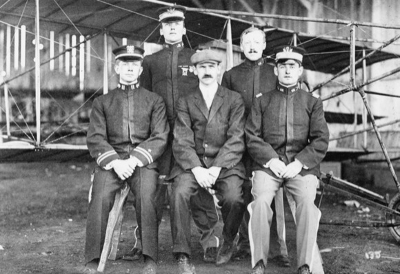 curtiss and army pilots pose