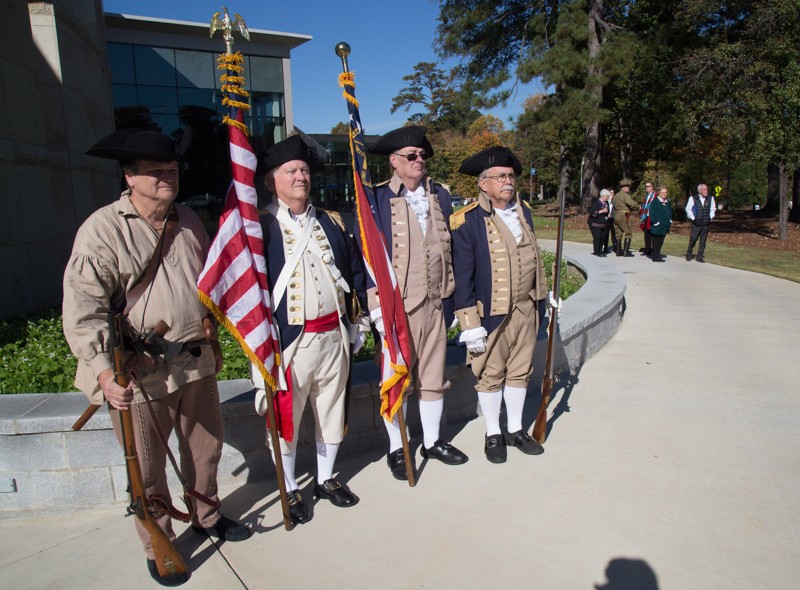 Georgia Society Sons of the American Revolution wait to present the colors before the start of the 2018 Veterans Day Commemoration at the Atlanta History Center on Sunday, November 11, 2018. 