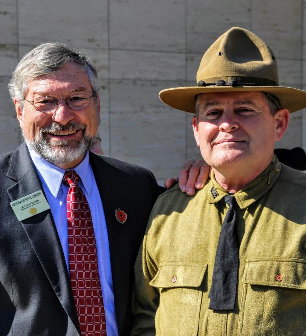 Dr. Lamar Veatch standing next to a man dresses in WW1 uniform.