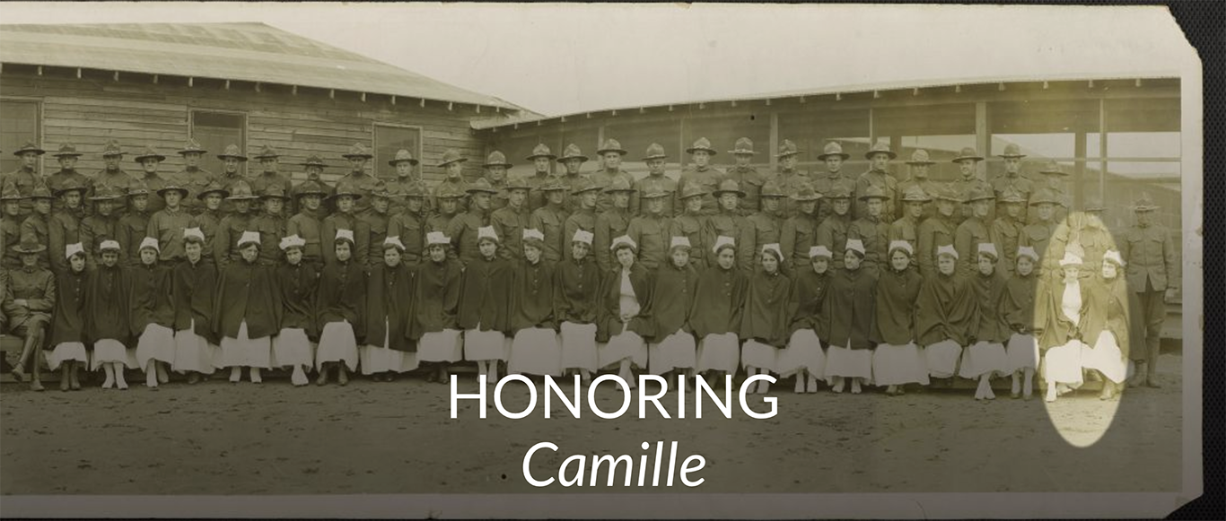 A black and white photo with two rows of soldiers and one row of red cross nurses. Camille is highlighted with a circle at the far right second from last.