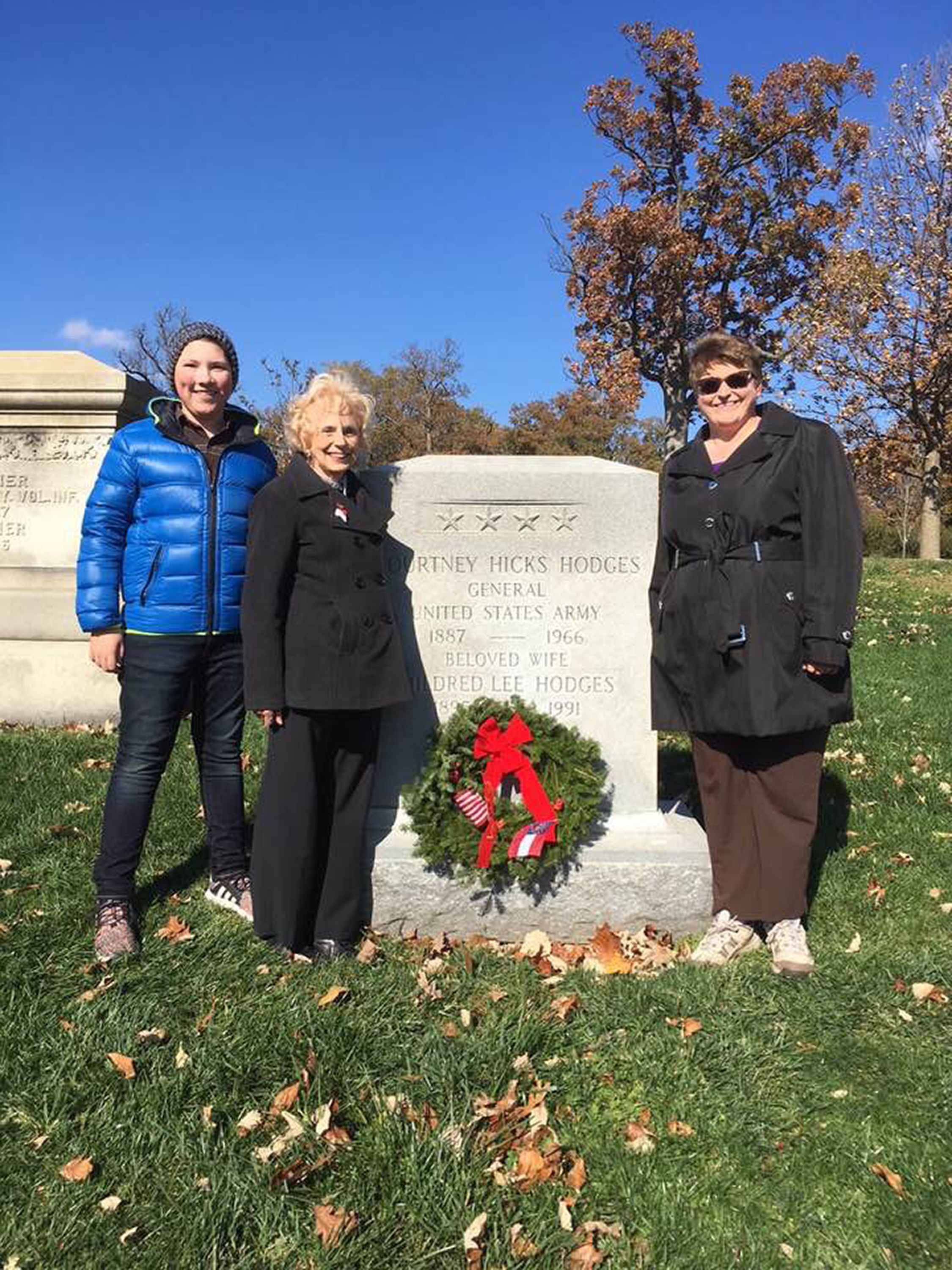 Georgia National History Day winner Daniel Wright joins Georgia World War I Centennial Commission advisory board members Virginia Dilkes and Laura McCarty in placing the Georgia WWI wreath on the Arlington Cemetery grave of General Courtney Hodges, Distinguished Service Cross recipient from WWI.