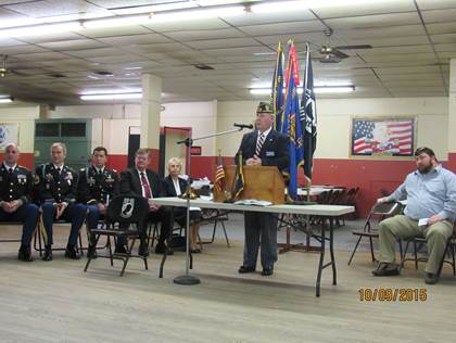 Man speaking at podium