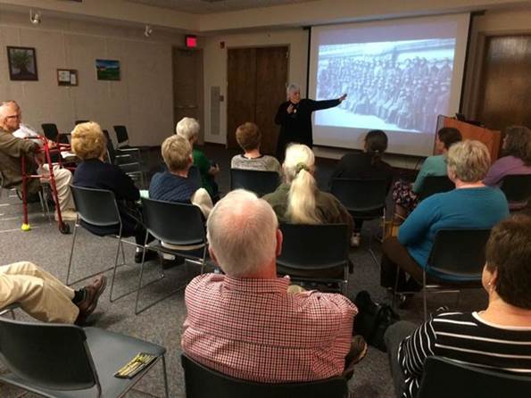 Storyteller Ellouise Schoettler giving a presentation