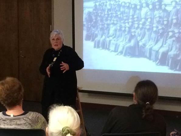 Storyteller Ellouise Schoettler giving a presentation closeup