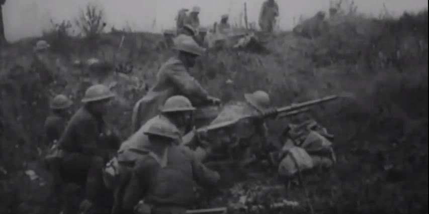 Men of the 313th Battalion firing a machine gun during World War I