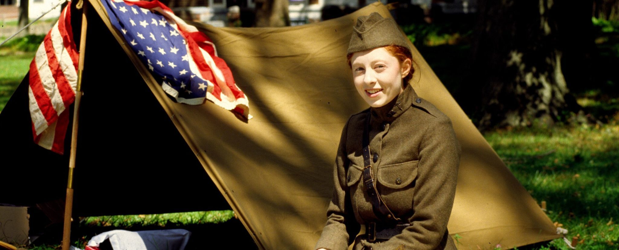 Lillian Fehler by tent at Camp Doughboy 2019