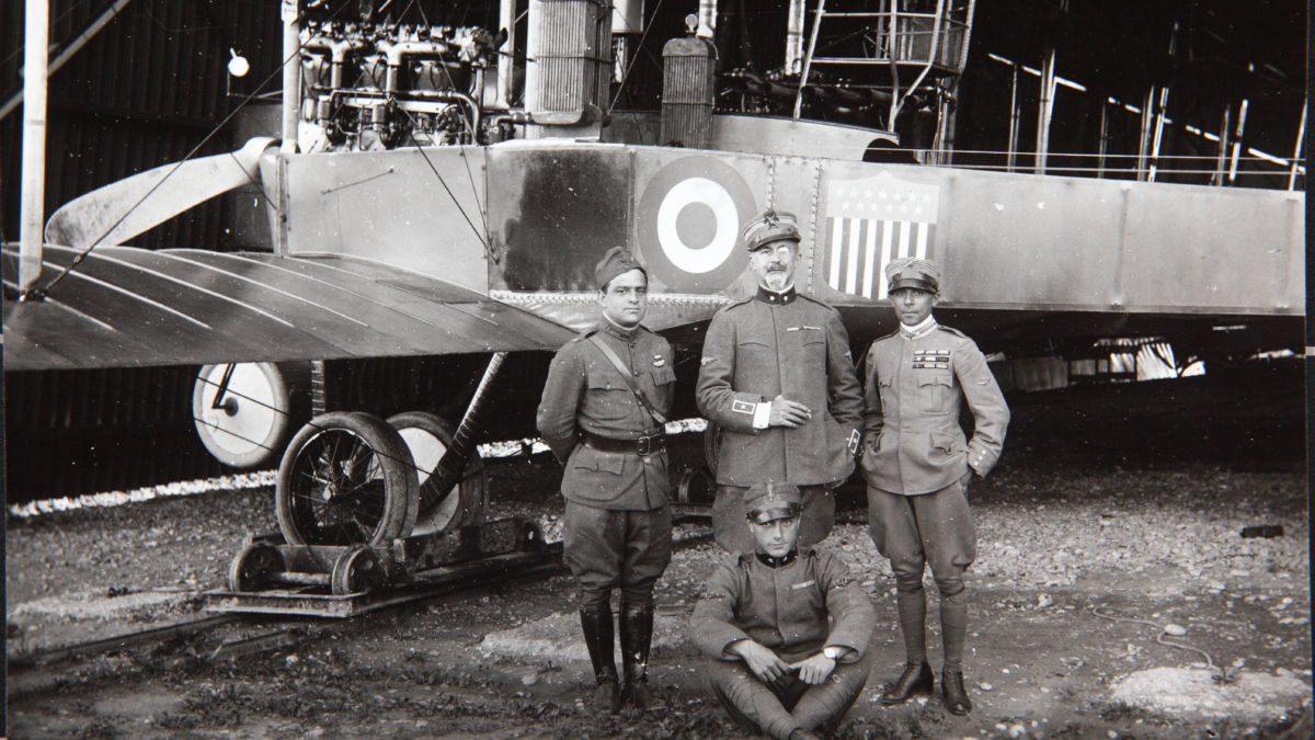 Fiorello La Guardia stands with Italian air force colleagues Major Piero Negrotto, Captain Federico Zapelloni and Sergeant Firmani in front of their Caproni bomber, the “Congressional Limited.”  (San Diego Air & Space Museum)