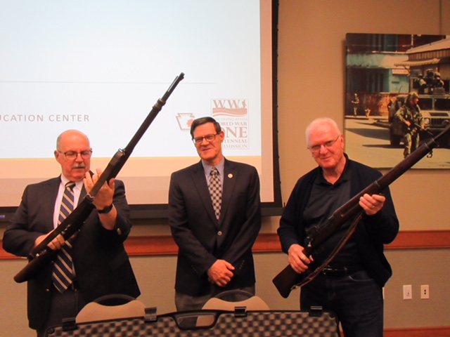 Kurt Sellers center showing the Eddystone and Mauser rifles