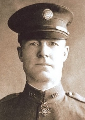 Samuel Woodfill wearing the Medal of Honor he earned by charging and disabling three machine gun nests during World War I.