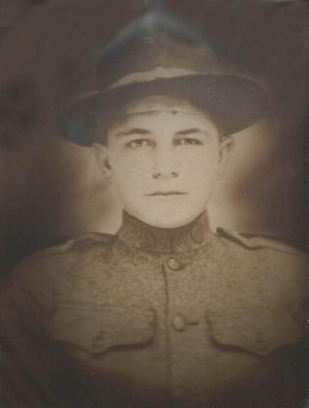 57f6dfad89e09 John Elco WW1 with gun