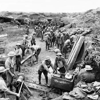 Miner loading explosives under enemy lines